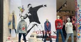 Banksy denúncia a Guess per fer servir il·legalment la seva obra i crida a robar de les botigues